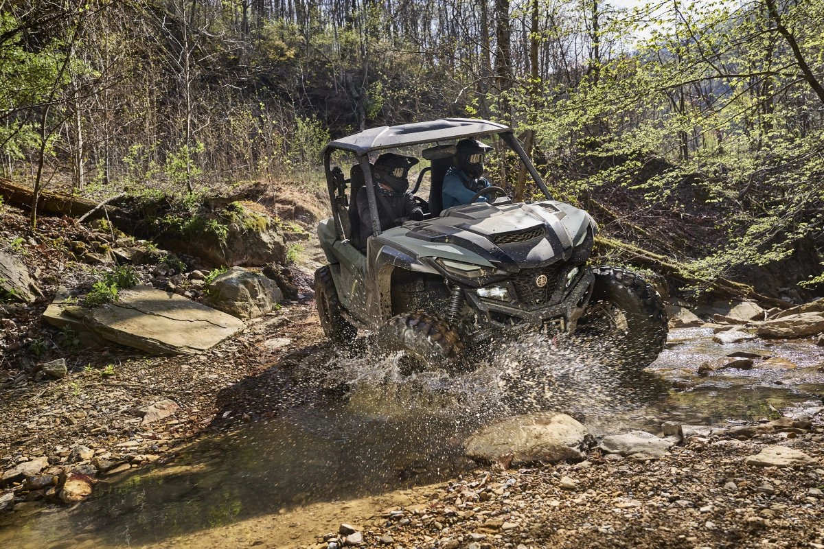 Yamaha Wolverine RMAX exploring a rocky forest trail in West Virginia