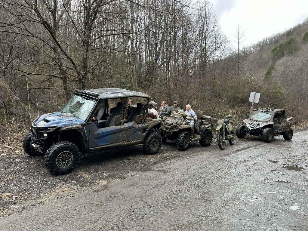 Riders gathering for a guided Eagle ATV trail adventure