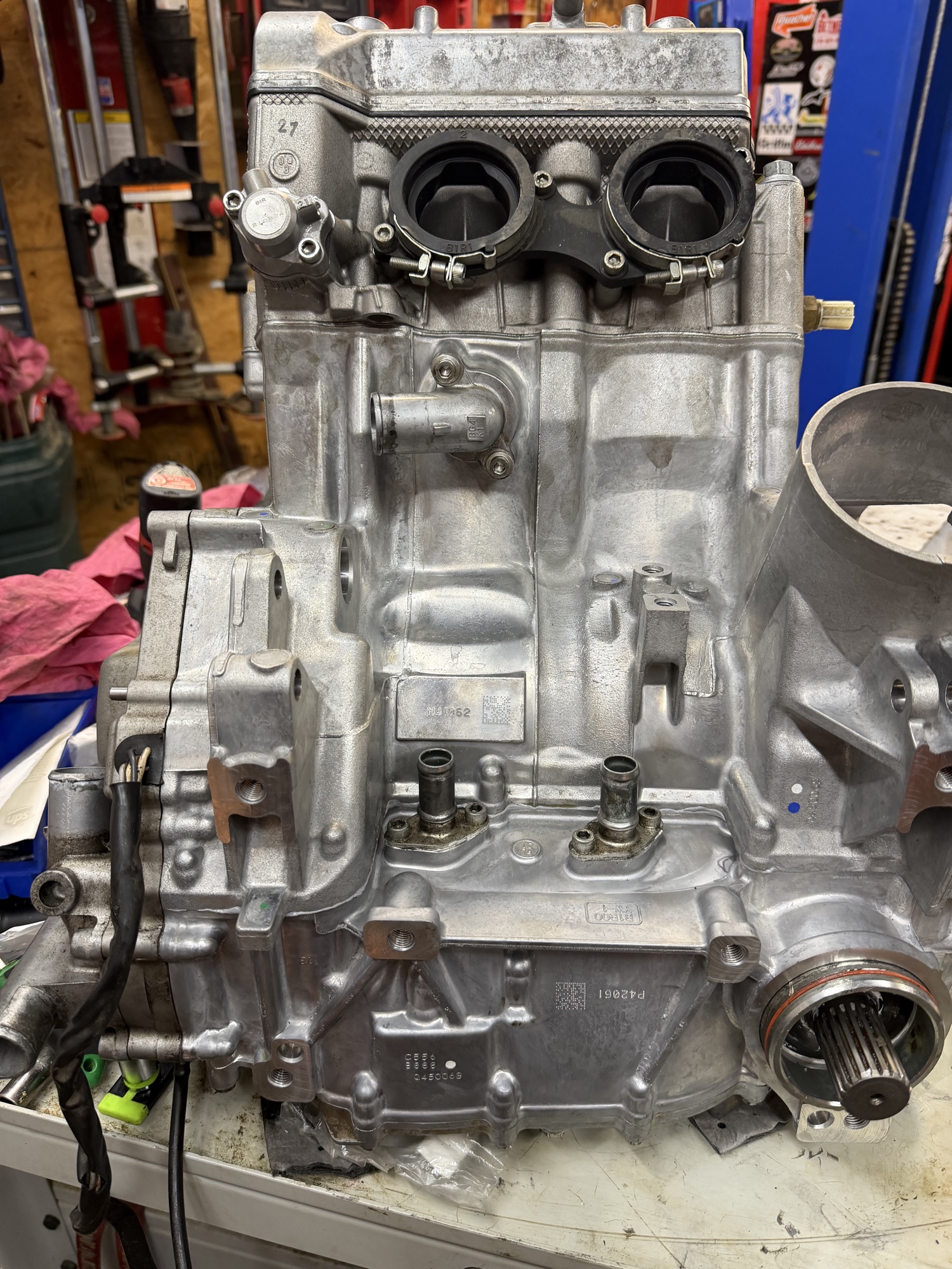 Yamaha Wolverine RMAX engine short block on the workbench at Eagle ATV, valve cover removed
